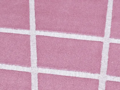 Tappeto rotondo rosa con linee bianche Vivienne di Besana Moquette