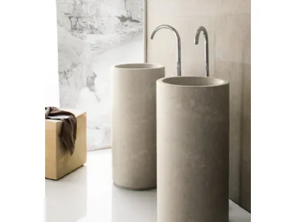 Lavabo in pietra naturale dalla forma cilindrica Minimal Monolite di Neutra