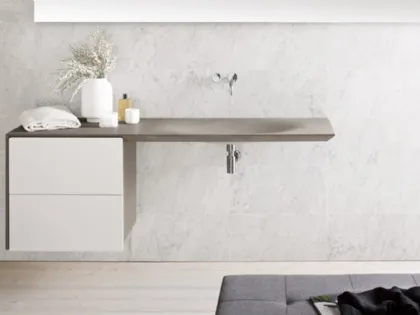 Mobile da Bagno in pietra con lavabo integrato e cassetti in legno laccato Neos di Neutra